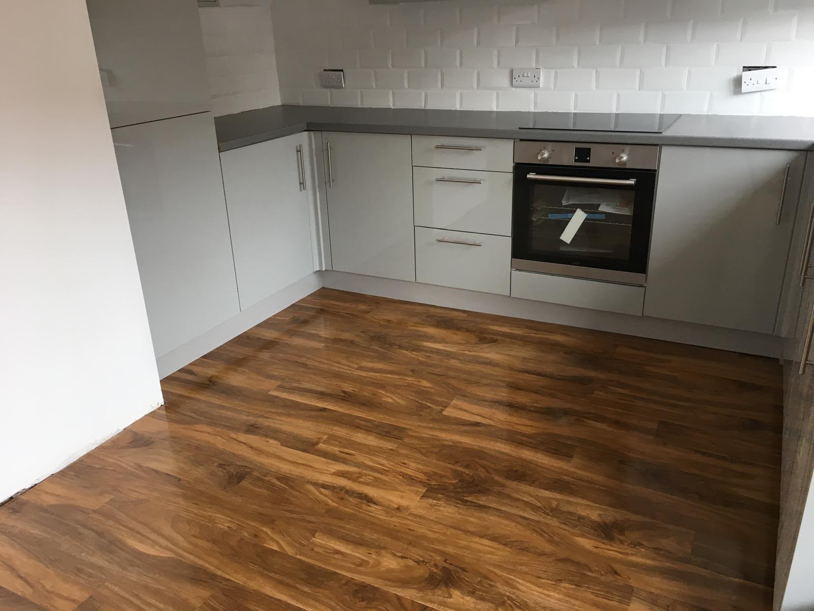 Completed kitchen with fitted units by DR Smith Building, Cotswolds.